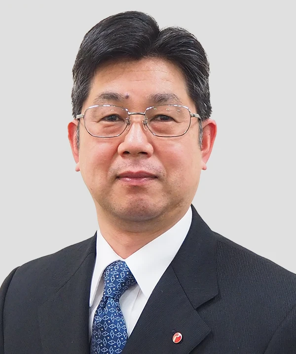 董事、高级常务执行官兼企业规划部总经理 Politics Shimada 的照片。